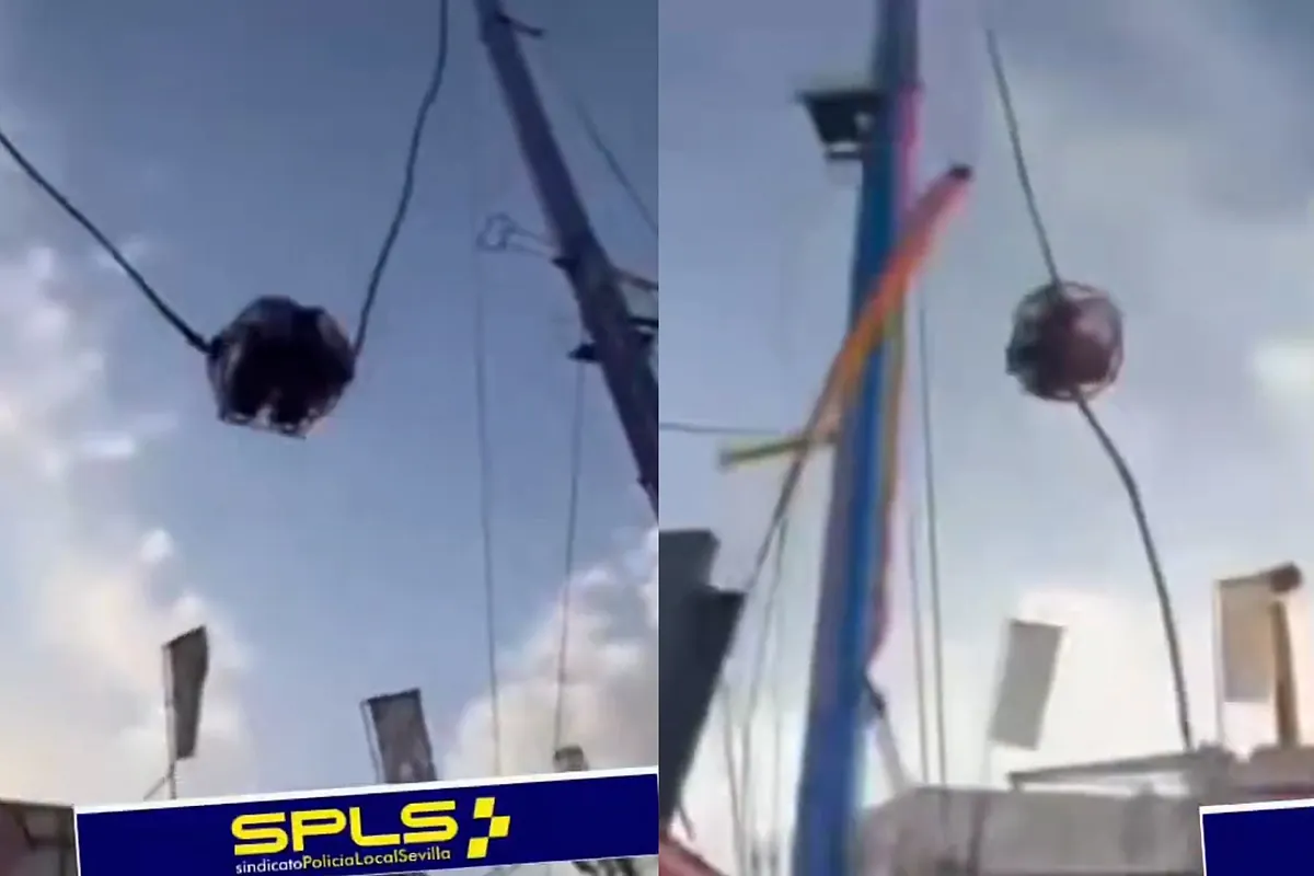 Momento en el que se rompe una atracción de feria en la calle del Infierno, Sevilla