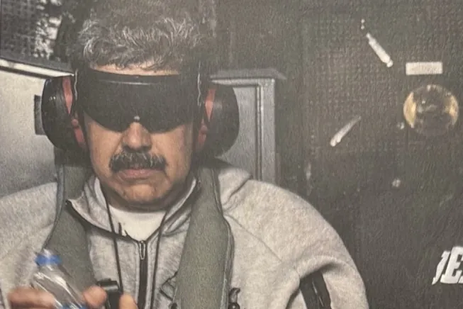 Trump Posts Photo of Detained Maduro on US Ship - News Directory 3
