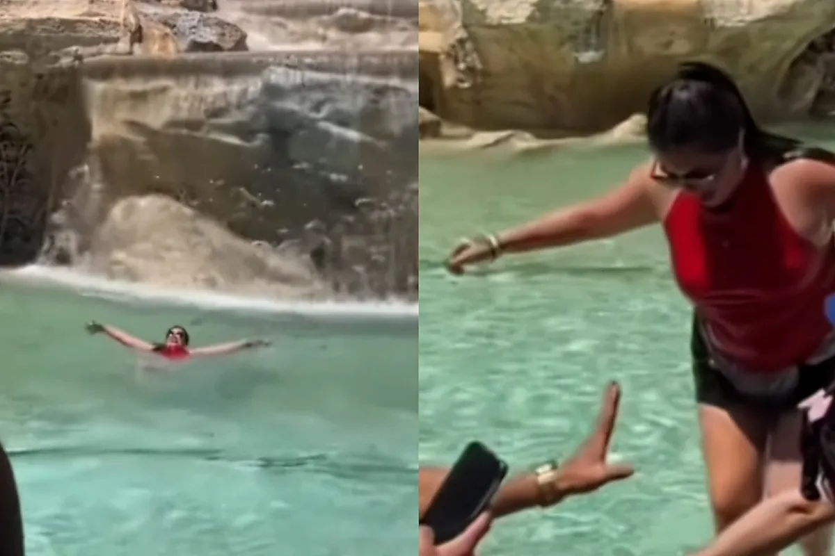 Una turista se lanza a la Fontana di Trevi en Roma para refrescarse por la ola de calor