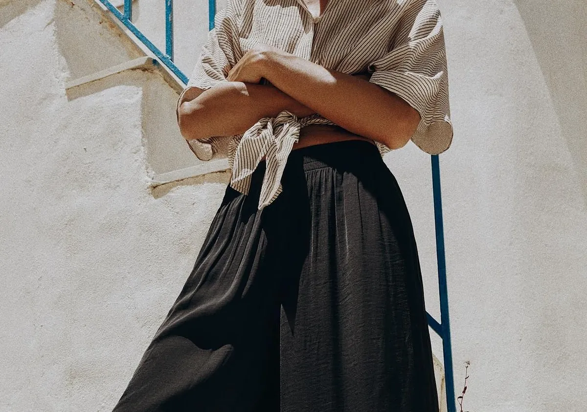 Adiós a los vaqueros: 8 pantalones negros fluidos de Zara y H&M que son los que eligen las que más saben de moda